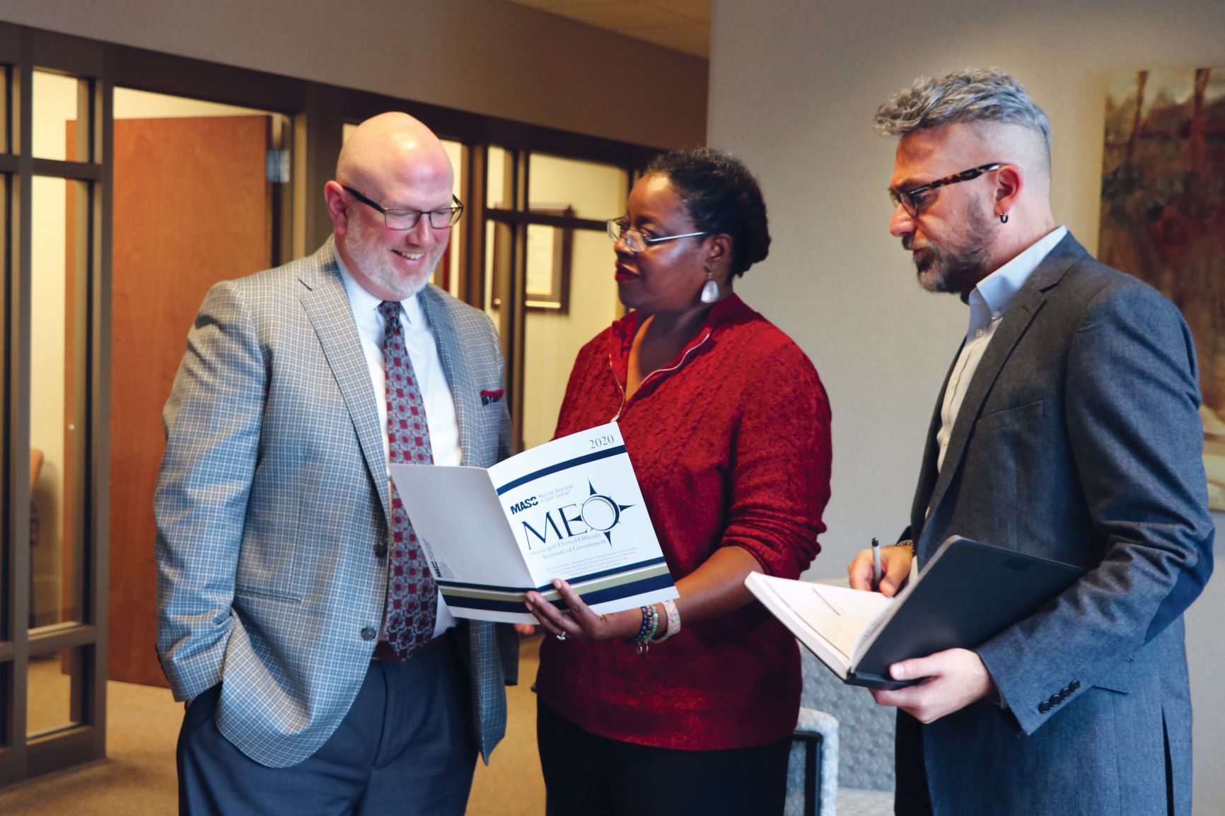 The Municipal Association's Todd Glover, Urica Floyd and Ken Ivey