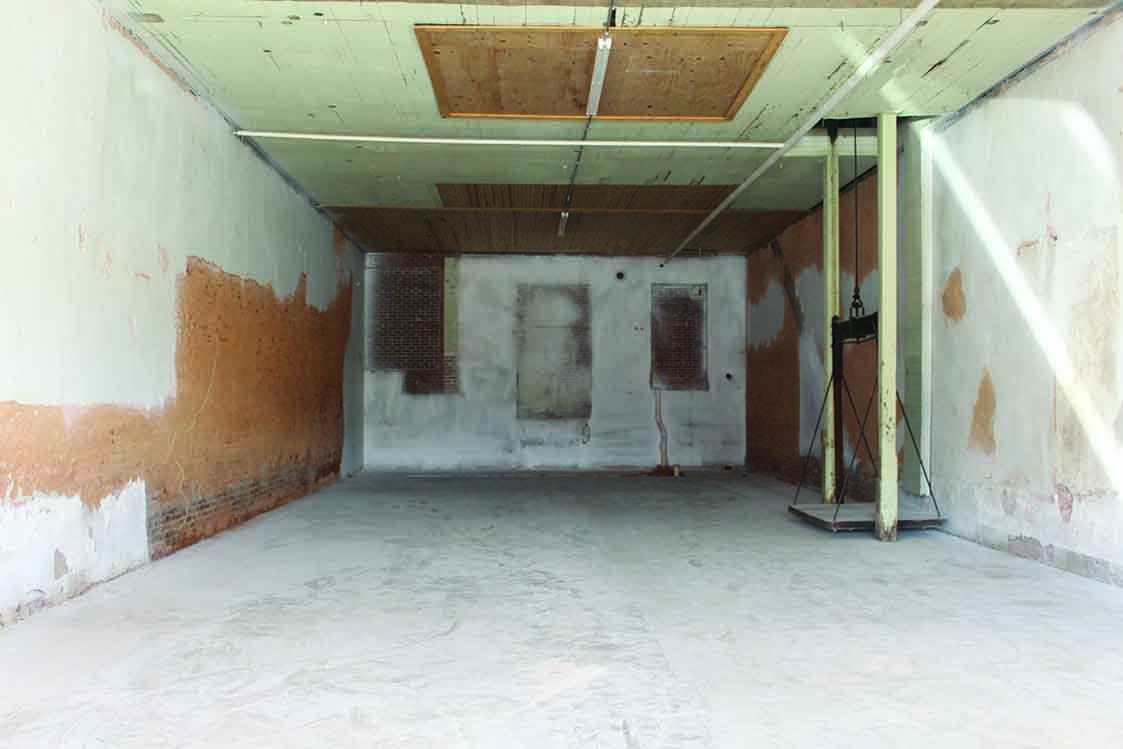 Tolly Furniture building in downtown Anderson, before.