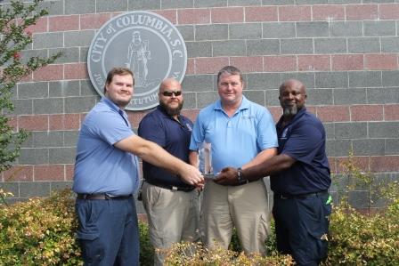 City of Columbia Metro Wastewater Treatment Plant staff, Brandon Wilcox, Adrian Martin, Ashley Dove and James Foust